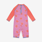 UV Protective Surf Suit Pink Starfish featuring a starfish pattern on a pink and orange swimsuit with long sleeves.